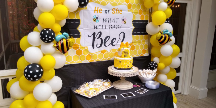 Baby bee gender reveal party balloon decorations in Raleigh NC
