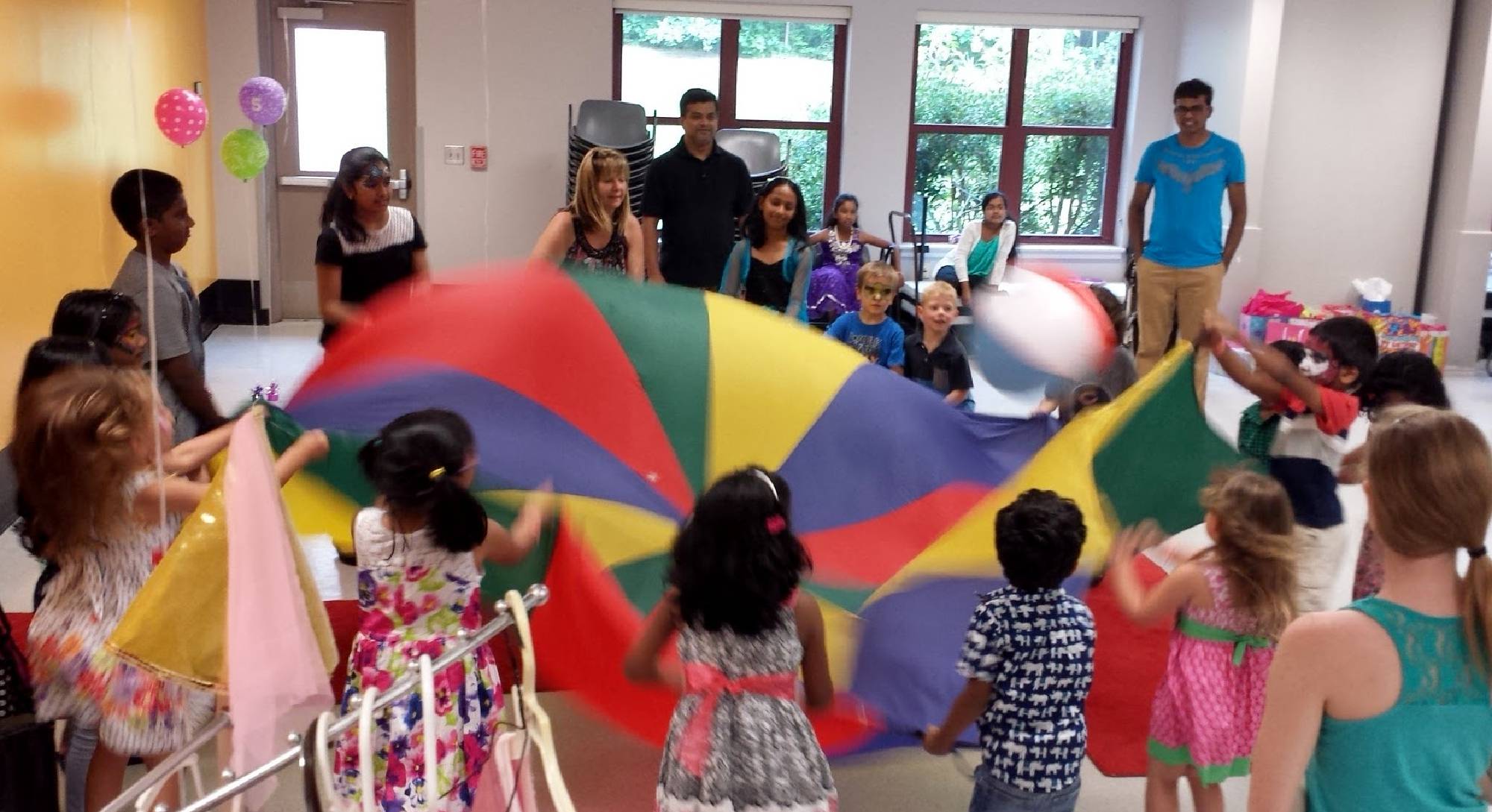 Parachute and games at the Apex Community Center