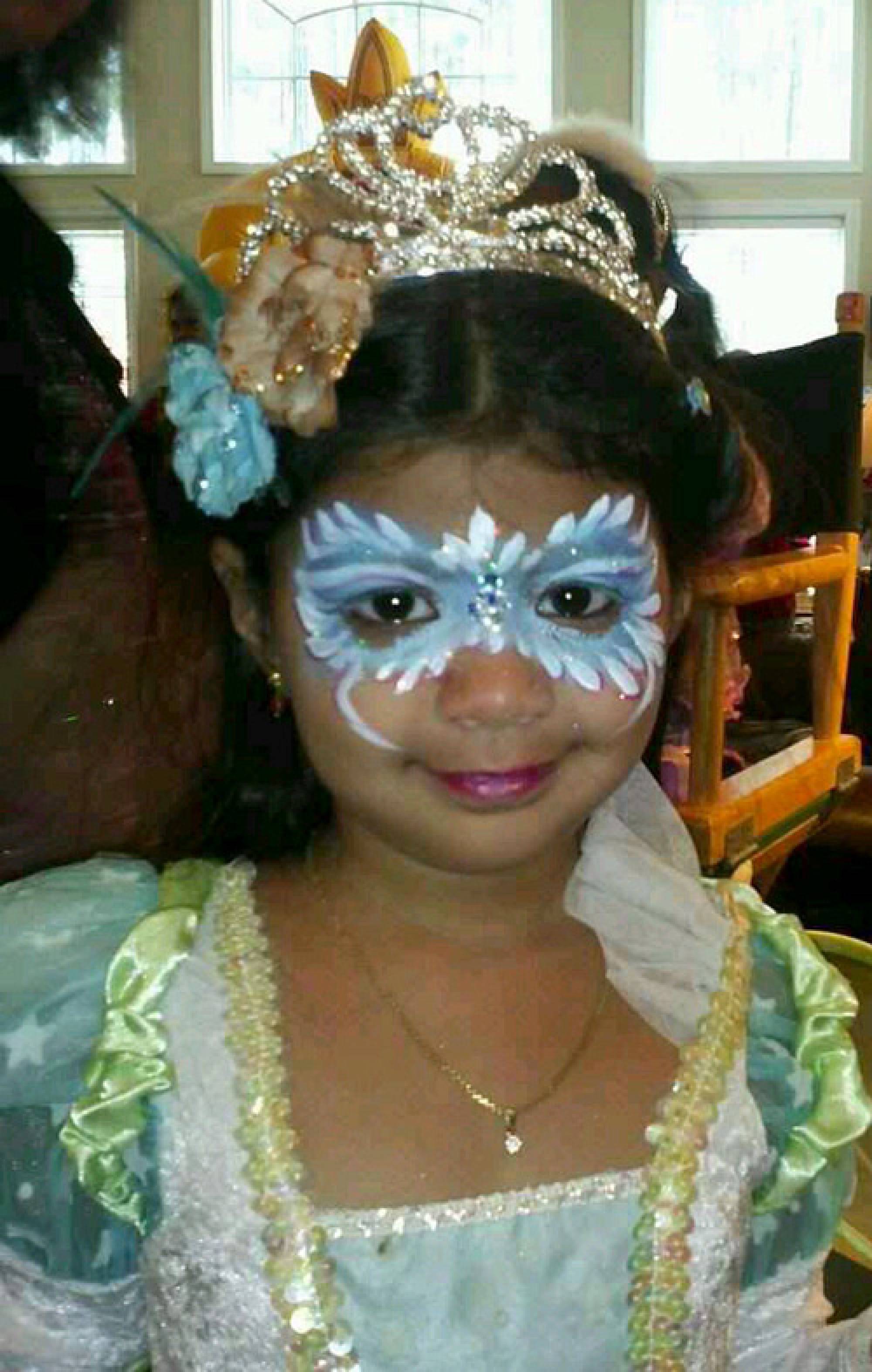 Princess with blue mask face painting